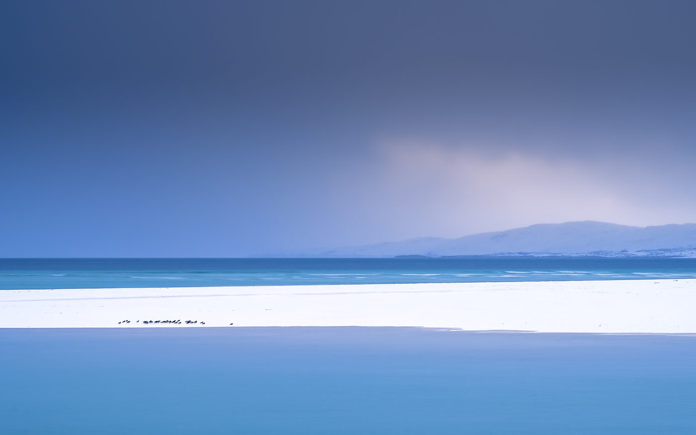 Minimal blue winter scene with snowy hills